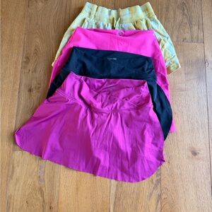Calvin Klein Pink, Black, and Yellow Skirt Collection